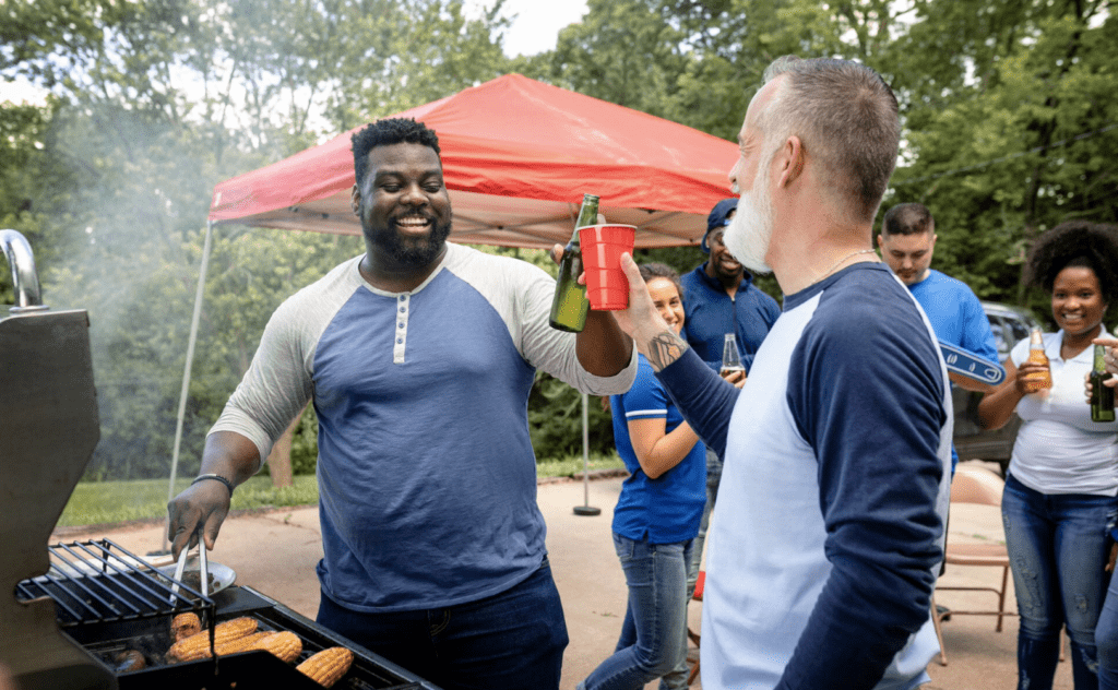 painting business owner hosting a bbq for a paint pop up party. 